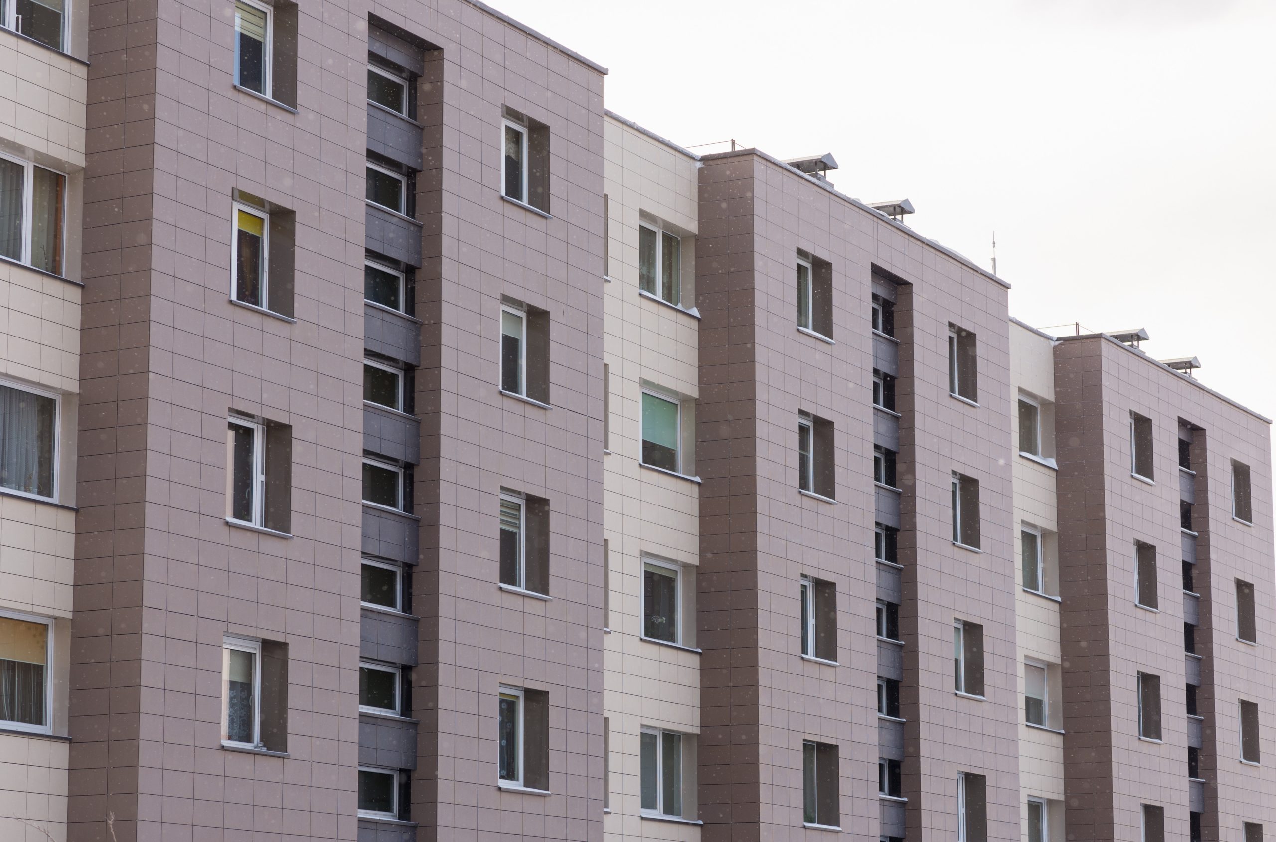 Fragment apartment flat building exterior. Detail of New luxury house and home complex. Part of City Real estate property and condo architecture.